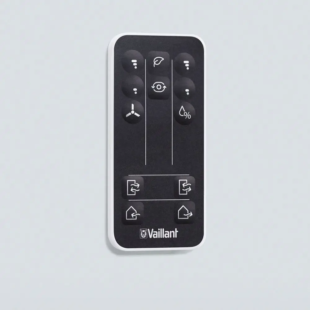 Fernbedienung von Vaillant mit mehreren Tasten zur Steuerung, einschließlich Symbole für Einstellungen und Funktionen, auf flacher, schwarzer Oberfläche montiert.
